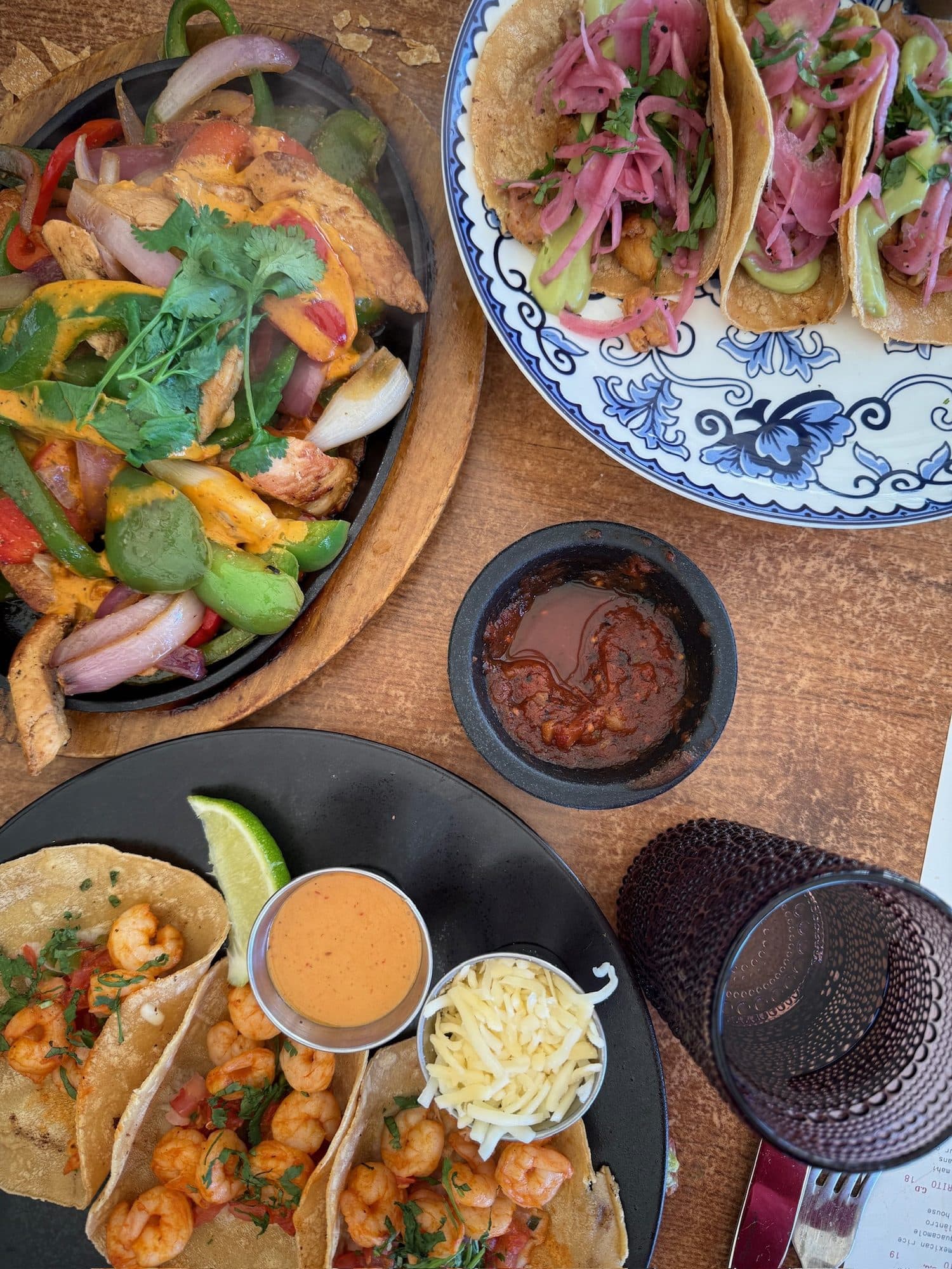 A table of tacos and fajitas